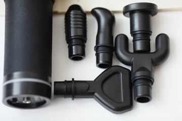 Massage gun, handheld cordless professional percussion deep tissue body muscle fascia massager for athletes.