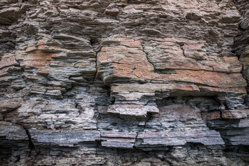Geologic rock formation, stone background.The texture of a rocky rock.