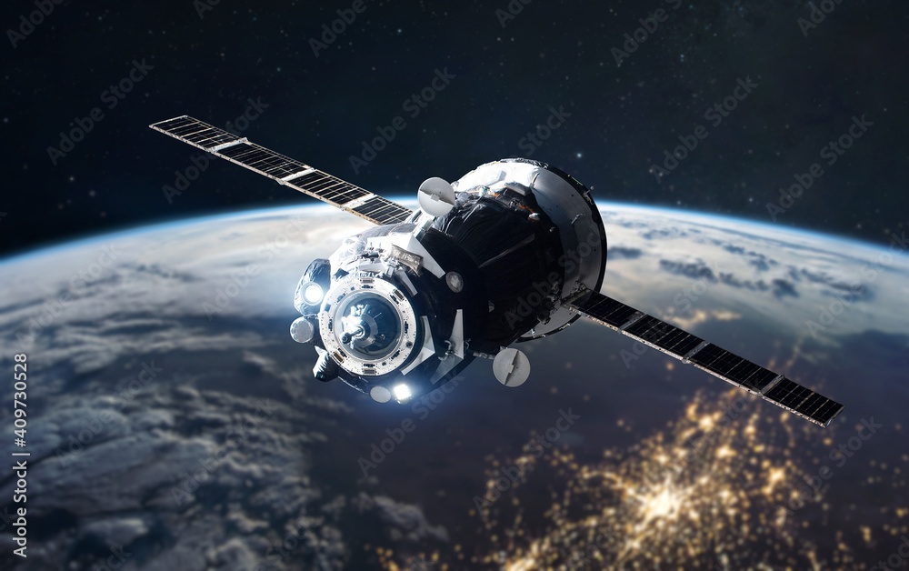 Aufkleber spaceship over earth in outer space. solar system. city lights at night. elements of this image furn