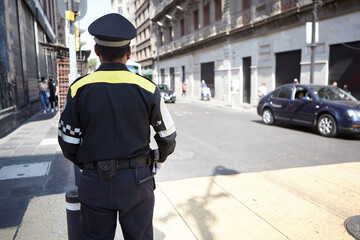 Transit police in Mexico City's historic downtown preserving hygienic safety measures in times of...