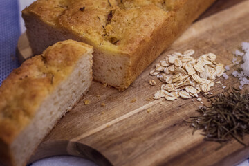 Rustic homemade bread made from rosemary and oats. Healthy homemade bread recipe. 