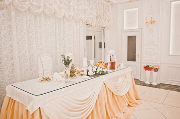 Ceremonial decoration of the wedding table for the bride and groom 250