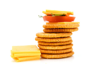 Delicious crackers with cheese on white background