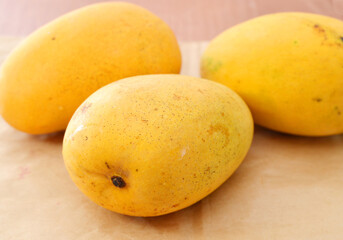 mango chunks on wooden board