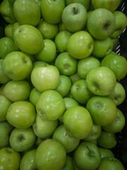 basket of green apples