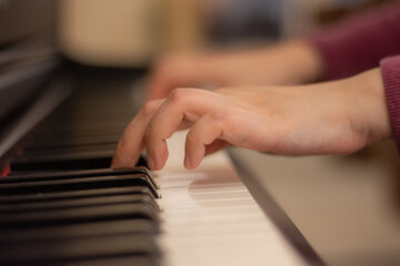 Fototapeta na wymiar Hands on Piano 