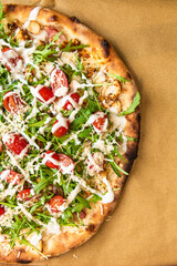 Fresh Delicious Restaurant Italian Pizza. Top Down View with Copy Space. Food Gourmet Background. Overhead. Pizzeria fast Food.