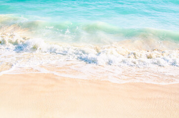 Waves and sand on the beach