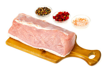 Fresh pink piece of raw pork meat, chop on white background. Studio Photo