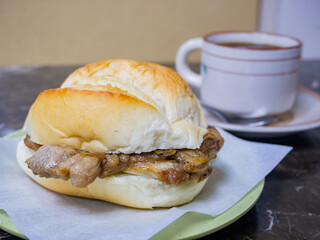 Close up shot of traditional pork bread Pork chop bun