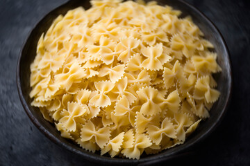 italian farfalle pasta raw uncooked blur defocused