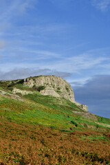 Cliffs along the Gower Peninsula, Wales. Beach cliffs and sea. 