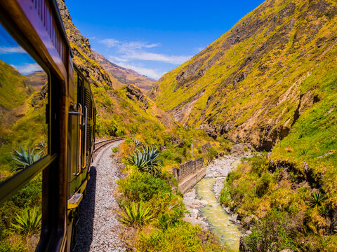 Impressive view of Devil's Nose train running on beautiful andean landscape, Alausi, Ecuador
