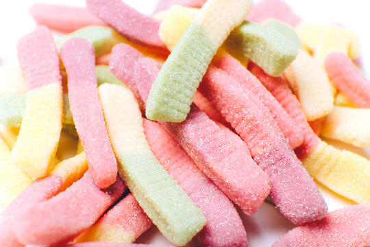 Pile of colorful pastel gummy candies, close up