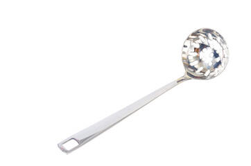 Kitchen utensils spoon with slots, slotted spoon isolated on white background. Studio Photo
