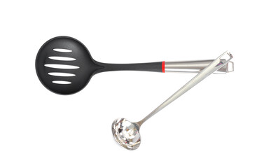 Kitchen utensils spoon with slots, slotted spoon isolated on white background. Studio Photo