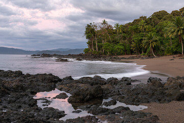 Fototapeta na wymiar Beautiful tropical beach at Corcovado National Park, Costa Rica. Sunrise.