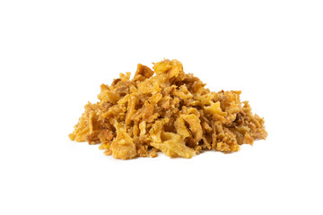 Crispy carmelized fried onion flakes heap isolated on white background. Spices and food ingredients.