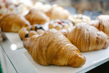 fresh croissants on counter close-up