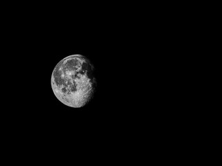 Close up of eighty seven percent of waning gibbous moon / The Waning Gibbous is an intermediary Moon phase. It starts right after the Full Moon and it lasts until the Third Quarter