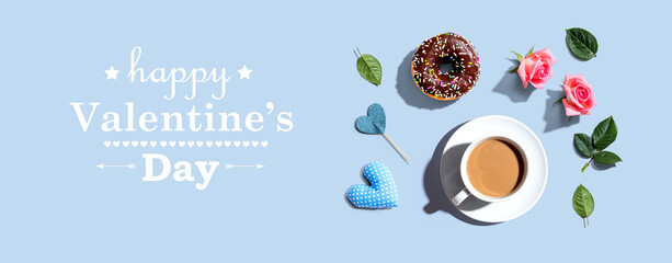 Valentines Day message with a cup of coffee and a donut - flat lay