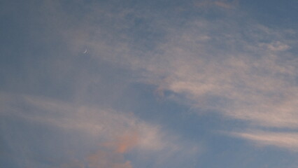 Naklejka na ściany i meble moon in the sky on a soft sunset