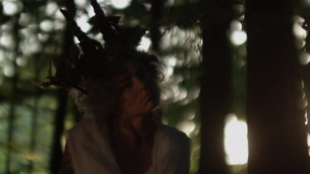 Woman In Goat Horn Headdress Dancing
