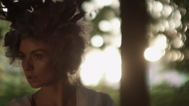 Woman In Goat Horn Headdress Dancing