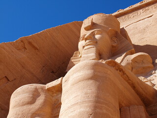 Abu Simbel, Egypt. Ancient Egyptian Pharaoh Rameses the 2nd. Landmark statue of the historical...