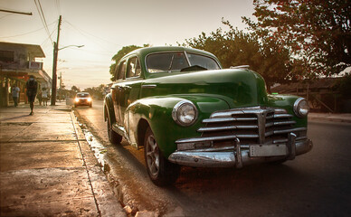 old vintage car on the streets of cuba - 409776757