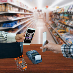 Scanning payment and verification. Businessman holding mobile smart phone  scanning  payment, buy and sell products clipping path 