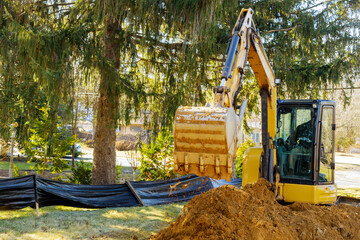 Excavator loader at earth moving construction works
