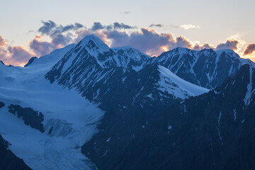 Fototapeta na wymiar Morning in the mountains, snow-capped peaks