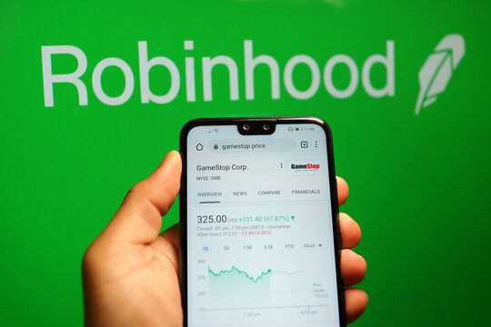 GameStop Corp stock index is seen on a smartphone. As retail traders pushed GameStop to record highs, retail investing app Robinhood temporarily restricted trades. PENANG, MALAYSIA - FEB 1, 2021.