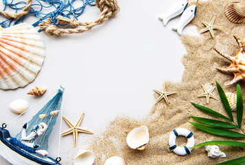Fototapeta na wymiar Seashells on sand. Travel concept