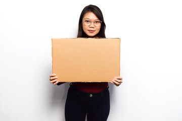 Showing blank sign poster for inscription and text of Young beautiful asian women dress red shirt isolated on white background