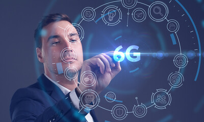 Business, Technology, Internet and network concept. Young businessman working on a virtual screen of the future and sees the inscription: 6G