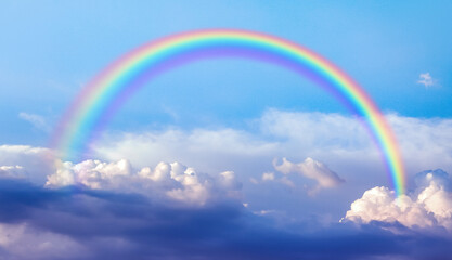 Beautiful view of blue sky with clouds and rainbow