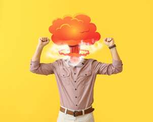 Young man with atomic bomb explosion instead of head on color background