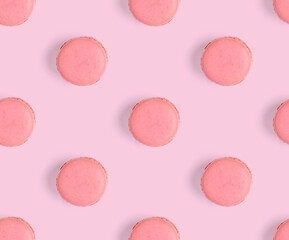 macarons seamless pattern. macarons isolated on pink background.