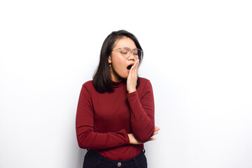 Fototapeta premium Yawn gesture expression of Young beautiful asian women dress red shirt isolated on white background