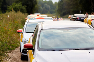 Queue of white taxi cars in Russia © Татьяна Кутина