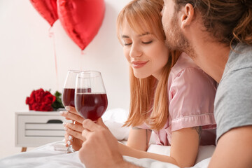 Young couple celebrating Valentine's Day at home