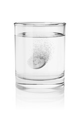 Effervescent tablet in a glass of water isolated. 3D rendering illustration.