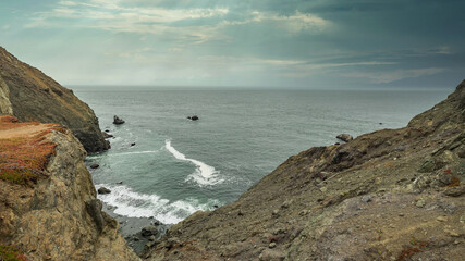 Great views of the California coastline along State Road 1, mountains and ocean. Beautiful landscapes concept