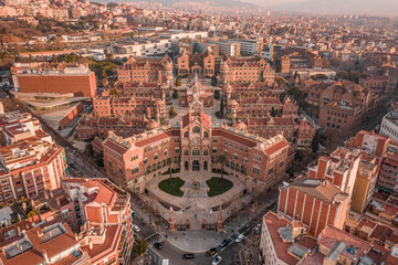 Fototapeta premium Aerial drone shot of Barcelona near Turo de la Rovira in morning sunrise