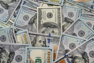 pile of american money 100 dollar bills as background