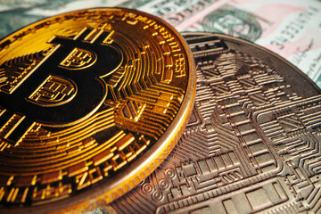 Fototapeta na wymiar Bitcoin on american dollar banknote close up