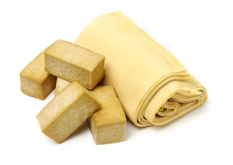 Dried bean curd and bean curd skin on white background. 