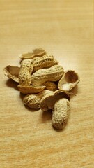 peanuts on wooden background